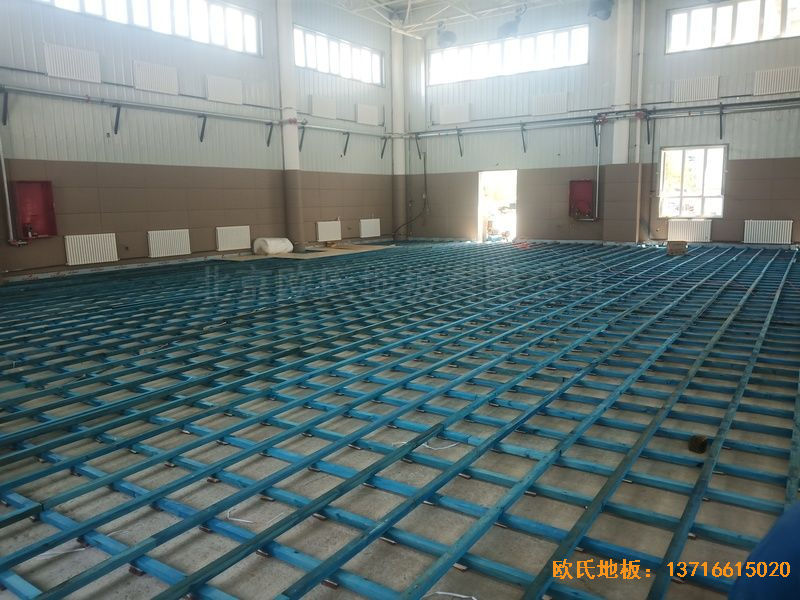 新疆克拉玛依市独山子虹园小区体育馆体育木地板施工案例